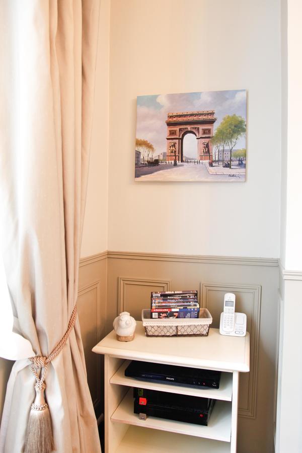 Le Triomphe Elysees Paris Bagian luar foto
